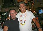 Bobby with bartender at Bobby's Monkey Bar, Key West