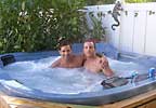 Frank & Brian enjoy the hot tub at GayStPeteHouse